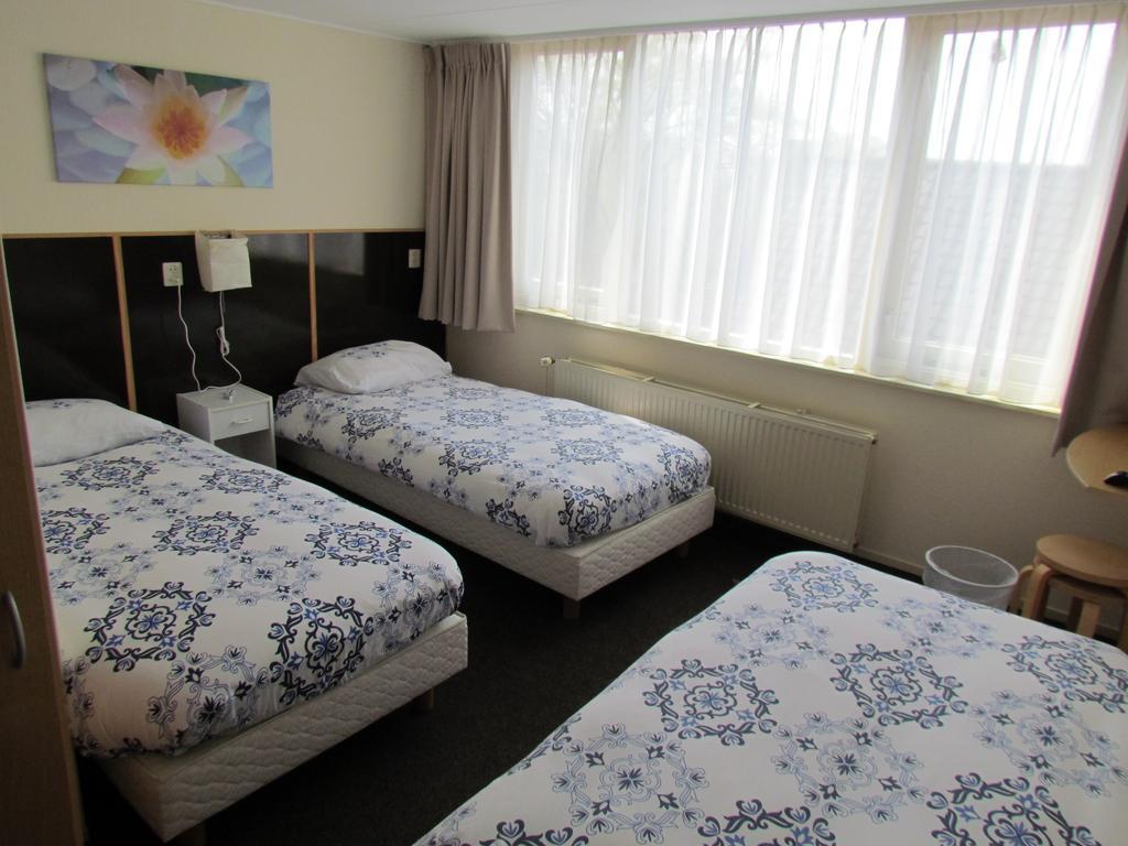 Hotel Cafe Woud Den Helder Bagian luar foto