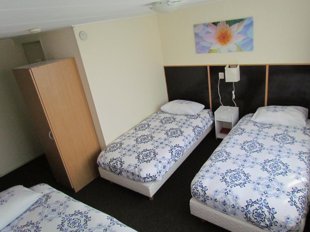 Hotel Cafe Woud Den Helder Bagian luar foto