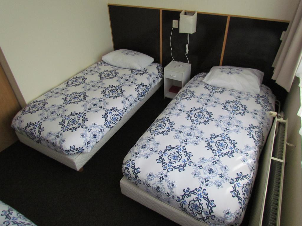 Hotel Cafe Woud Den Helder Bagian luar foto